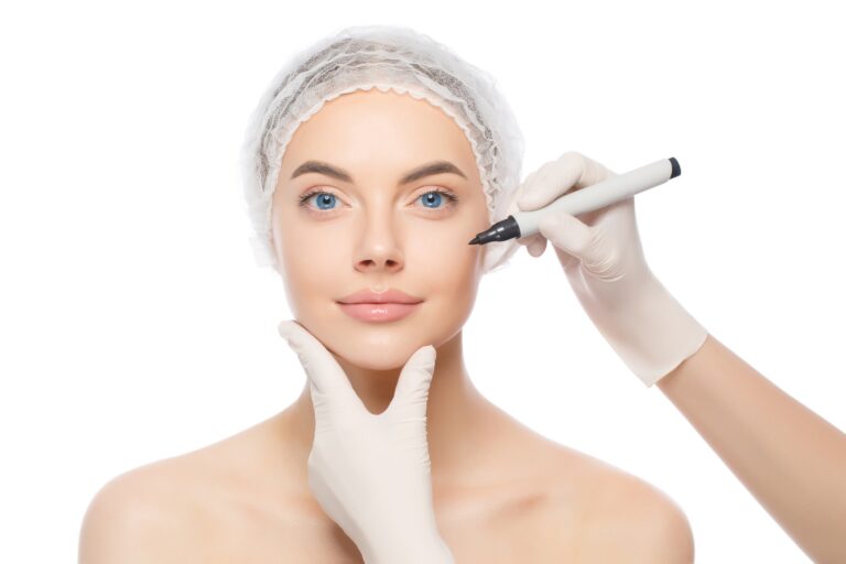 Pretty young woman prepared for facelifting procedure isolated on white background